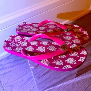 Hot pink Tory Burch flip flops
